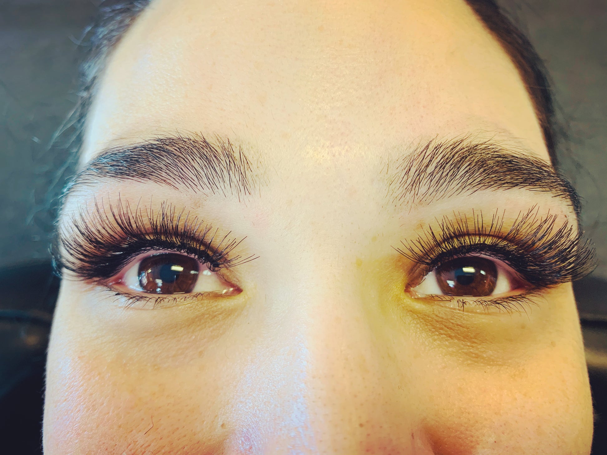 happy client after her eyelashes extended